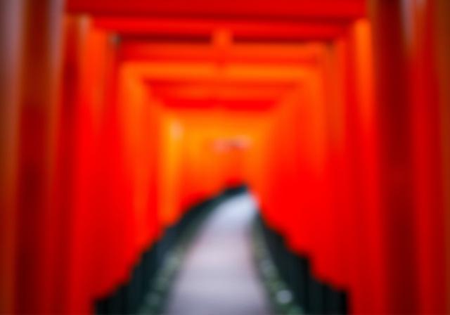 The endless tunnel of red torii gates at Fushimi Inari shrine in Kyoto.